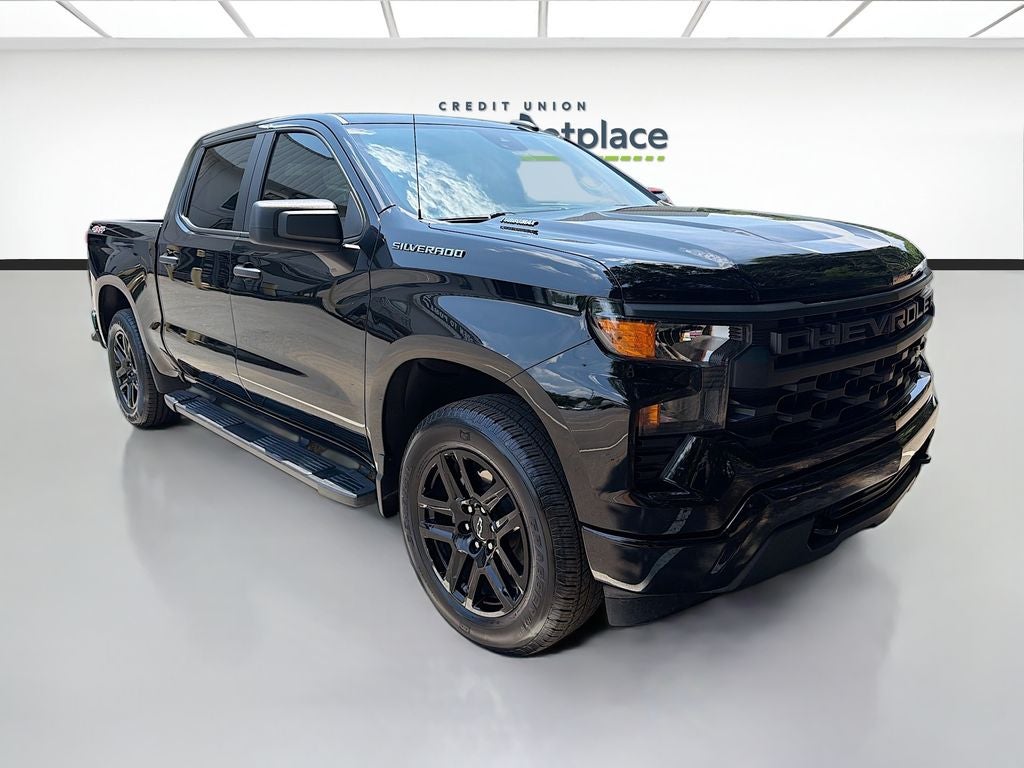 2025 Chevrolet Silverado Custom in Black — front three-quarter view