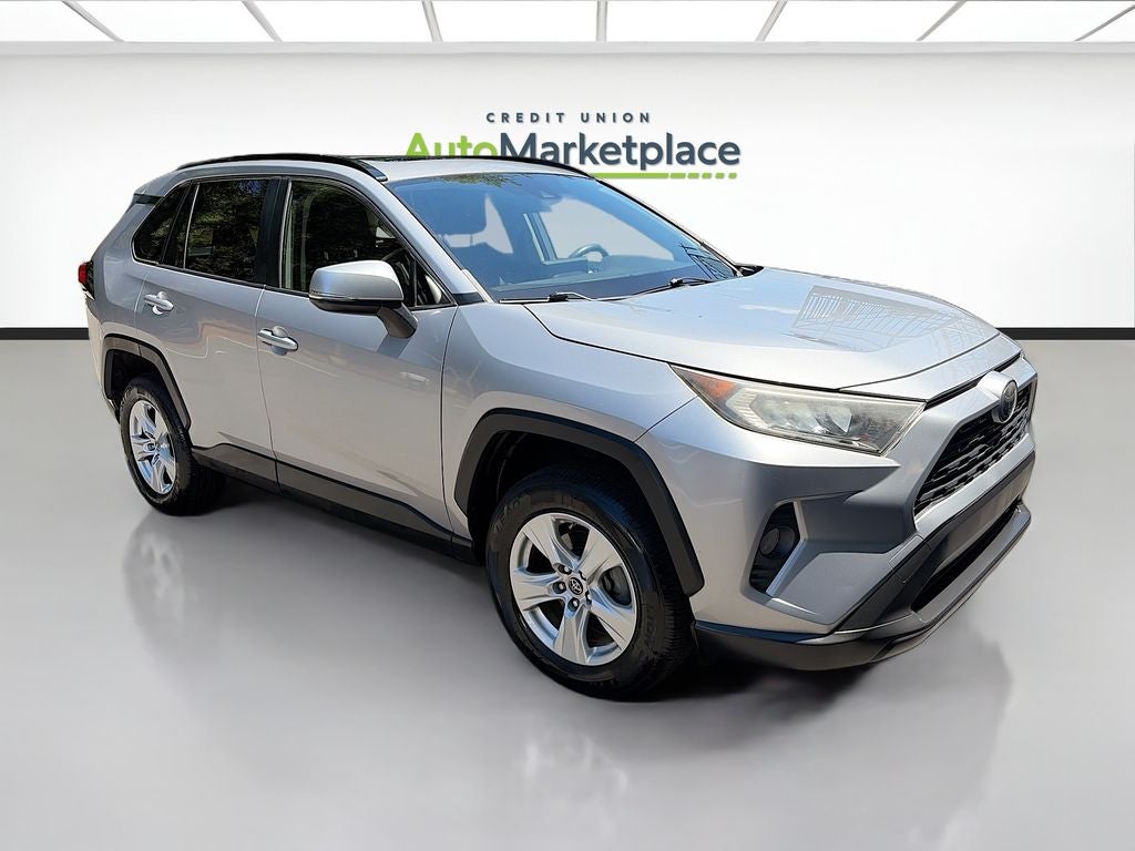 2019 Toyota RAV4 XLE in Silver Sky Metallic — front three-quarter view